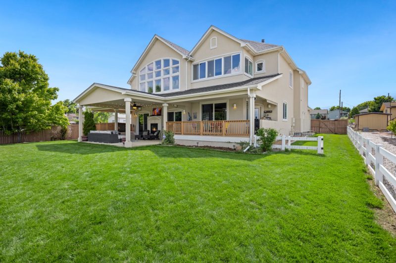 Home 142 Beautiful twostory suburban house with a large green lawn an 1783443846